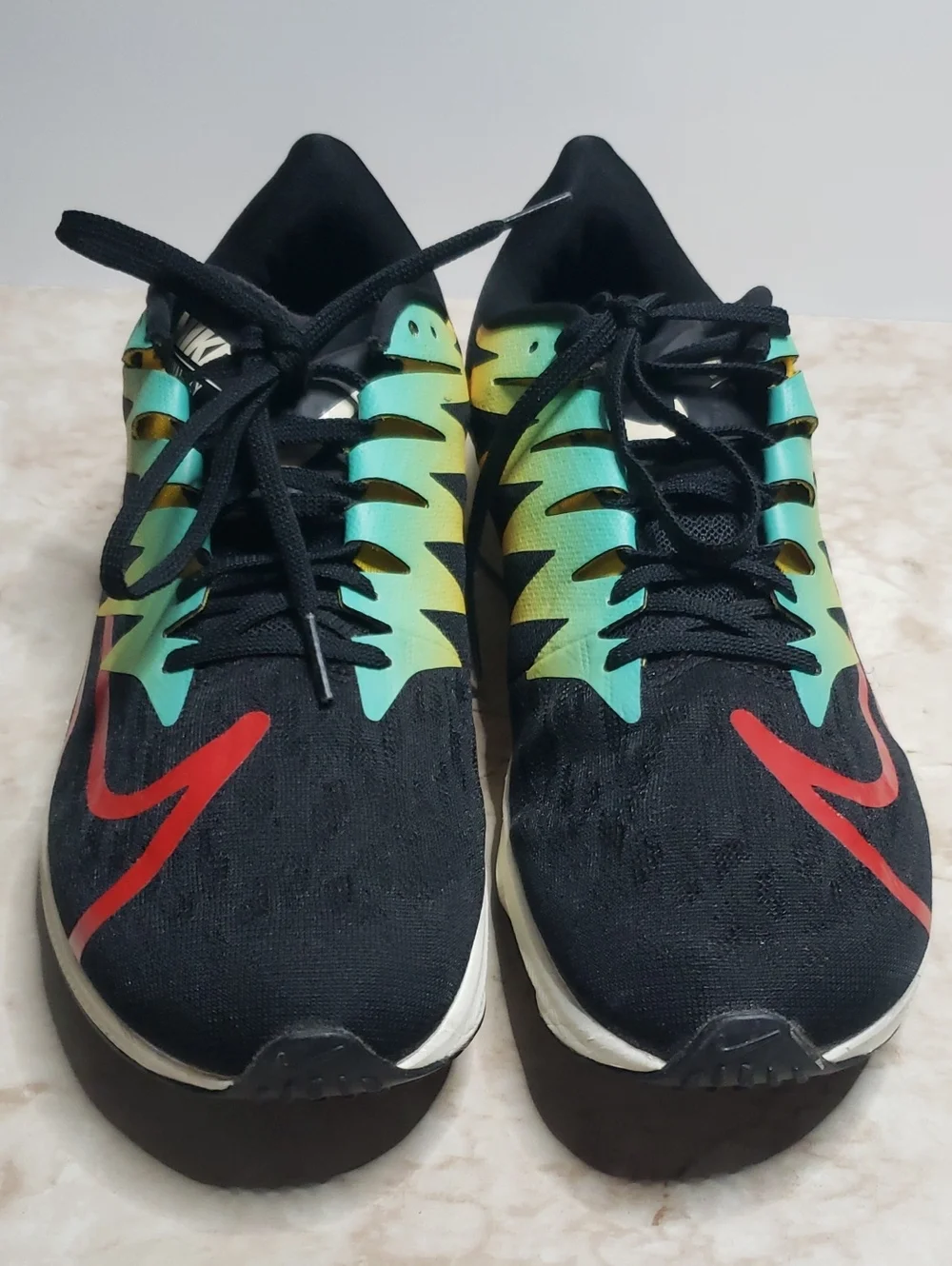 Nike Men’s Black Running Sneakers with Teal, Yellow & Red Accents 7.5